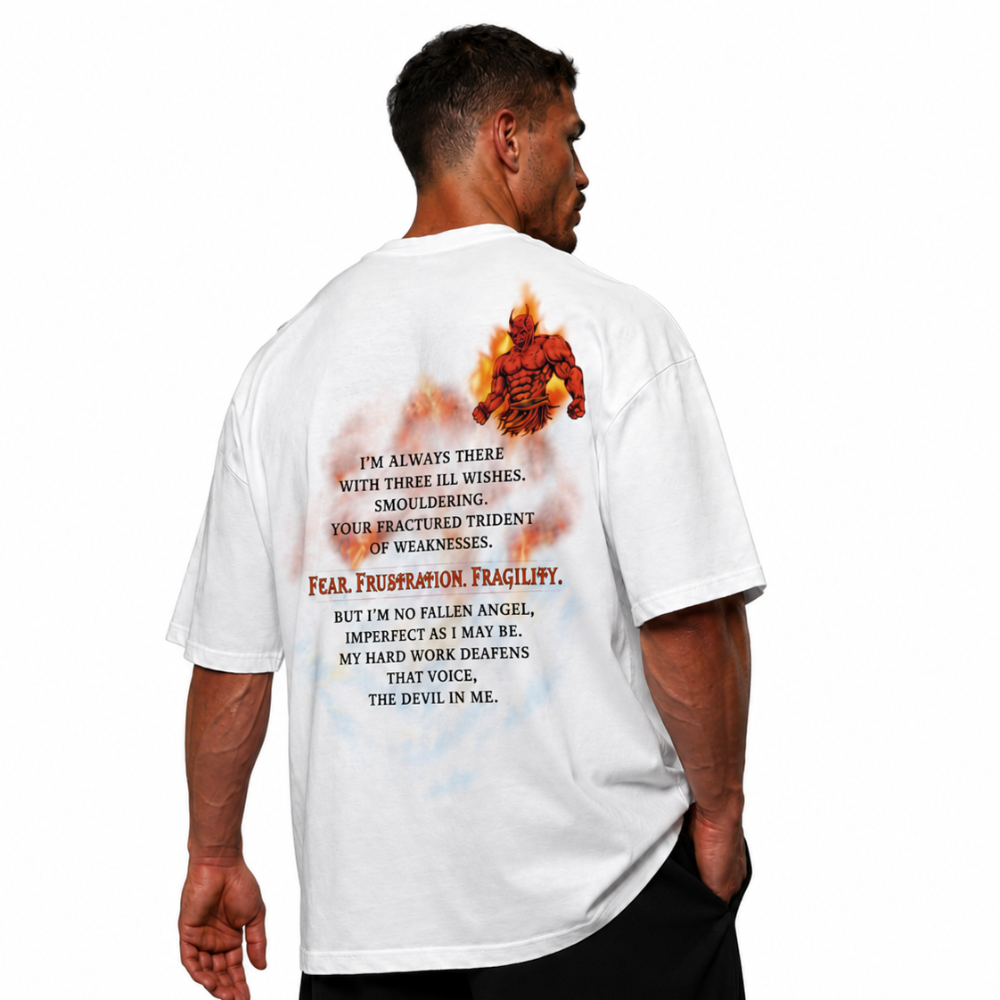 Man wearing the white Devil In Me gym t-shirt, side angle showing the oversized fit